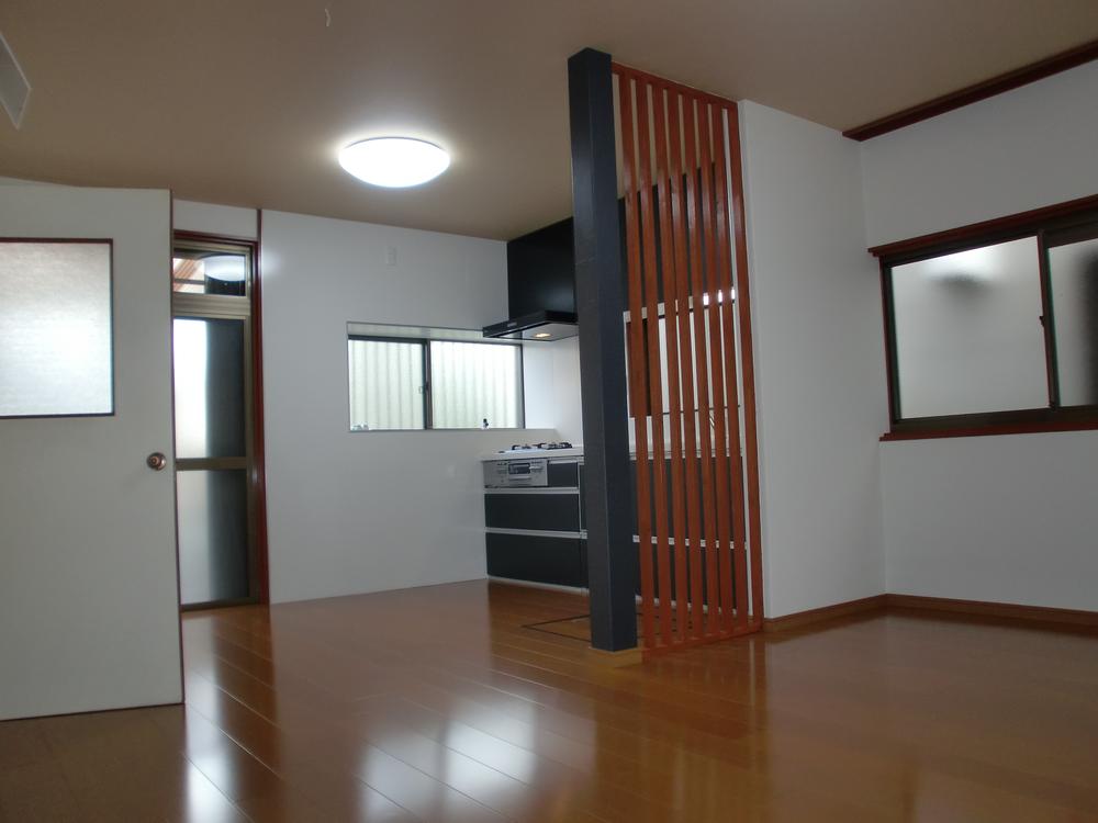 Living. Because there is a partition, We need to not be seen around the kitchen.