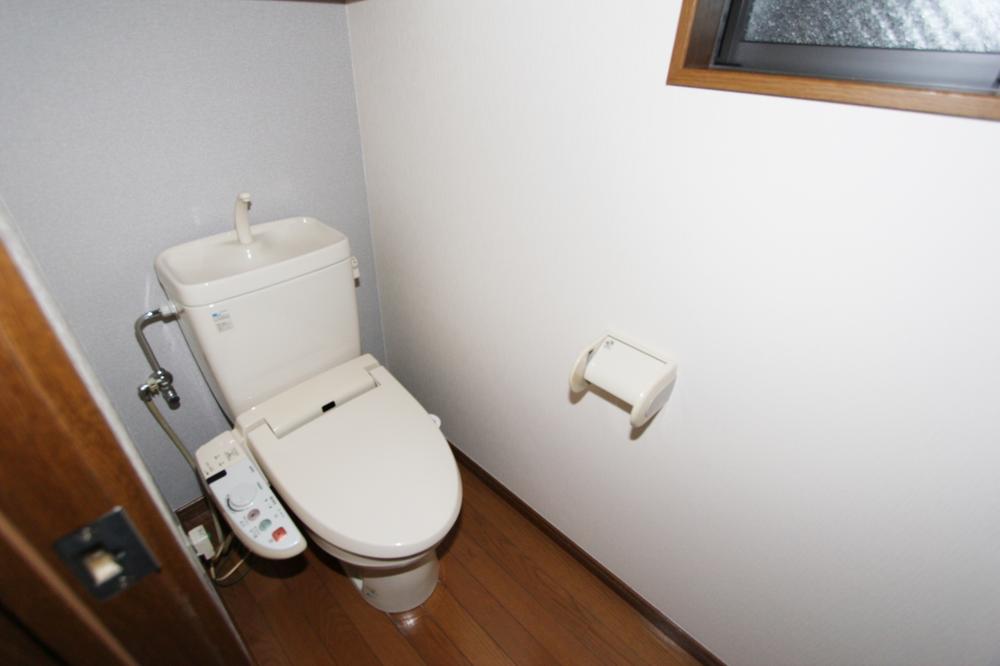 Toilet. Shower toilet is also attached. 