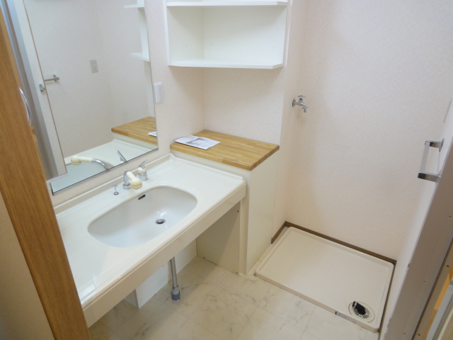 Washroom. It is easy to use and wash basin widely