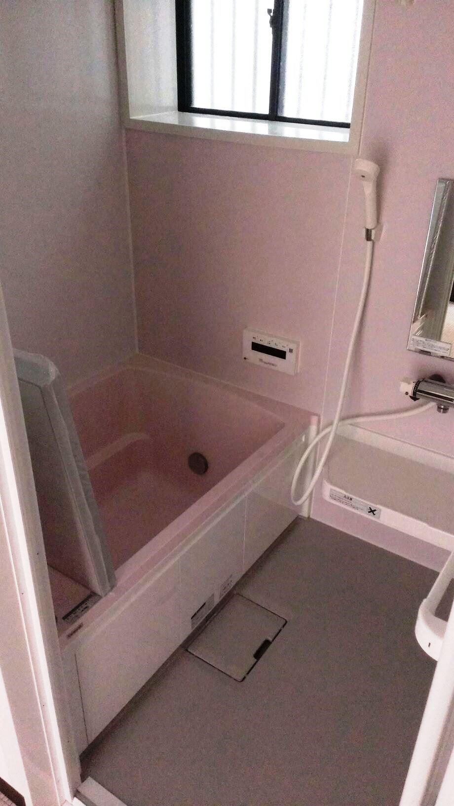 Bathroom. Clean bathroom bathed in light from the window.