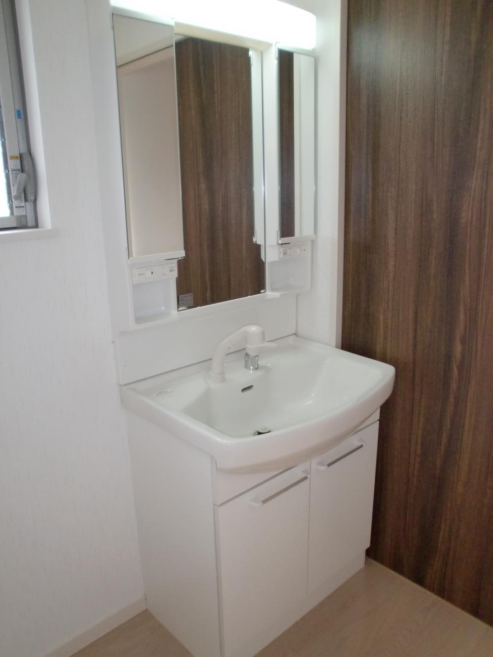 Wash basin, toilet. Easy-to-use is a good washroom.