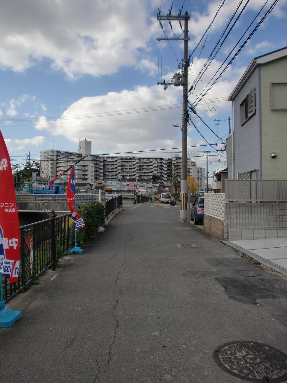 Local photos, including front road. It is a quiet residential area.