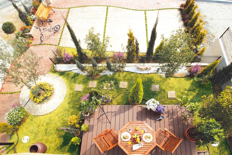 Building plan example (exterior photos). Garden single-family house be implemented in a site of clear. (Our example of construction)