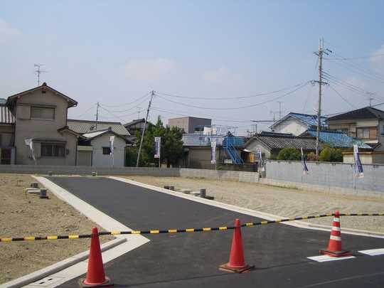 Local photos, including front road.  [Local land photo] Clean development has been local is, Plenty of open without feeling tall building around.