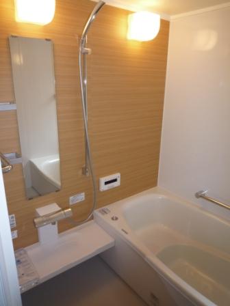 Bathroom. TOTO made. Thermos bathtub. Tired comfortably stretched out foot.