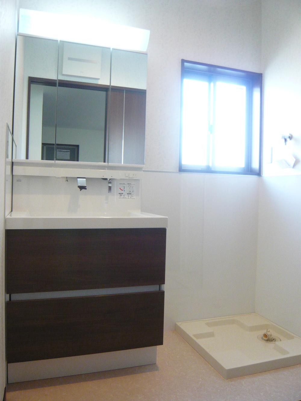 Wash basin, toilet. Vanity three-sided mirror accommodated with