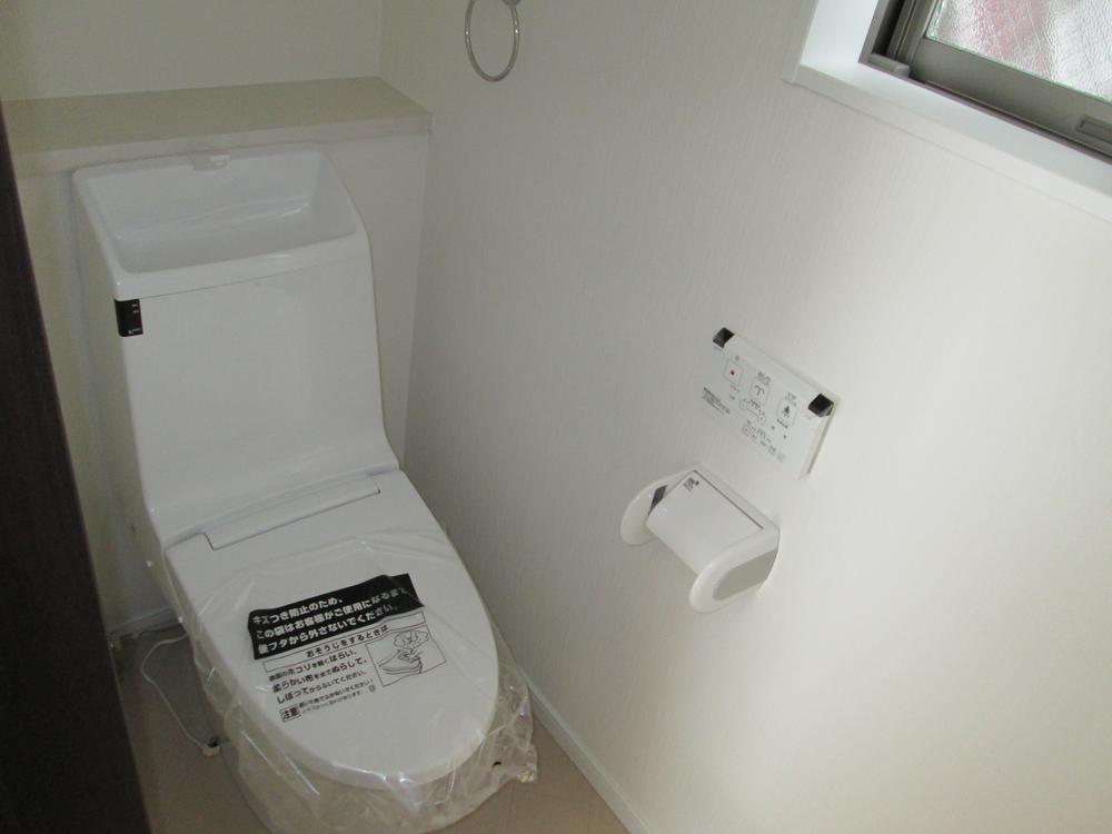 Toilet. Clean restroom in the high-performance.