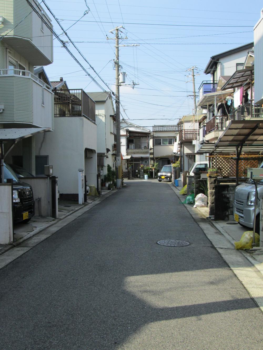 Local photos, including front road. Car as it expected little quiet residential area.