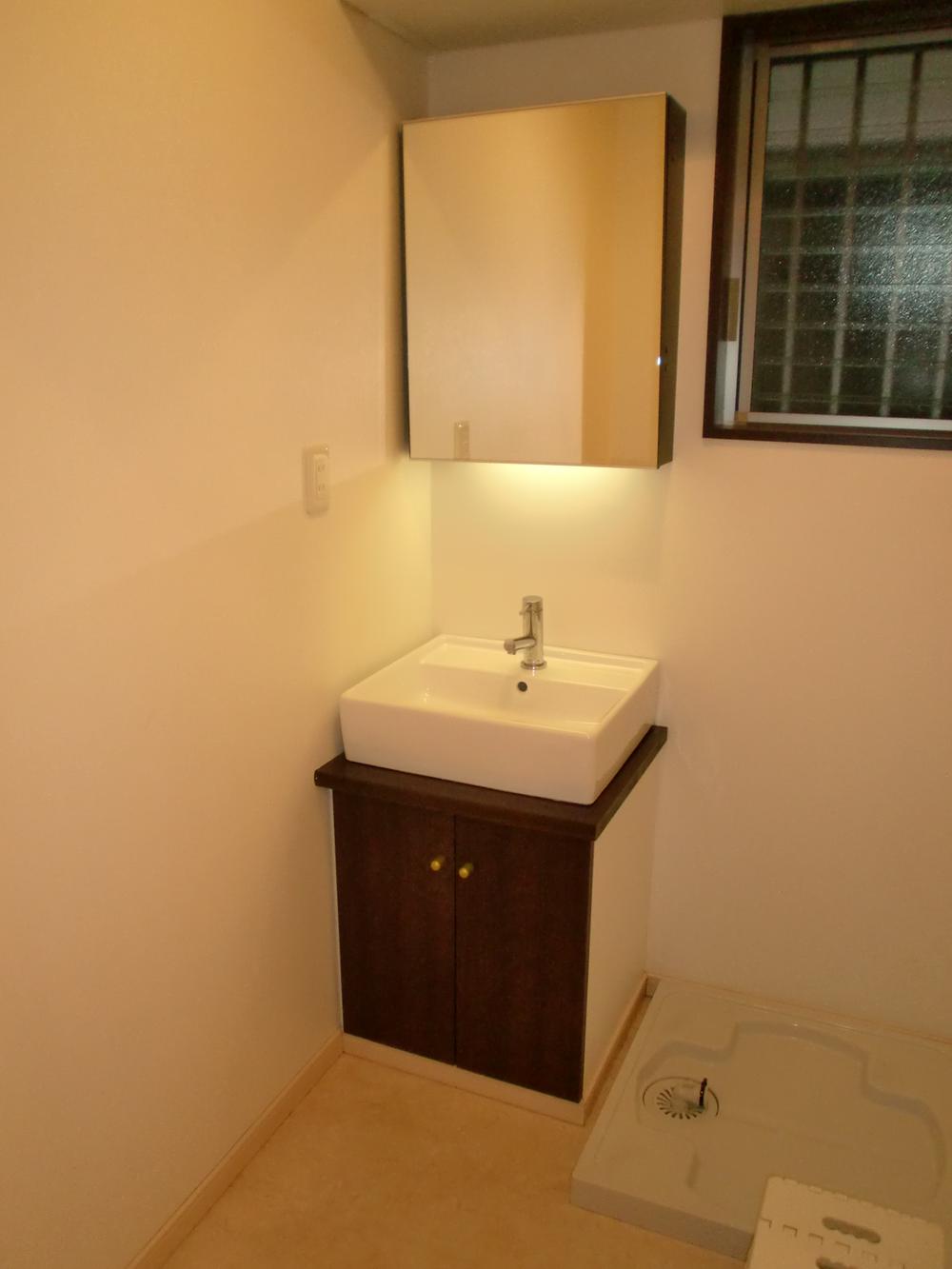 Wash basin, toilet. Washbasin with design.