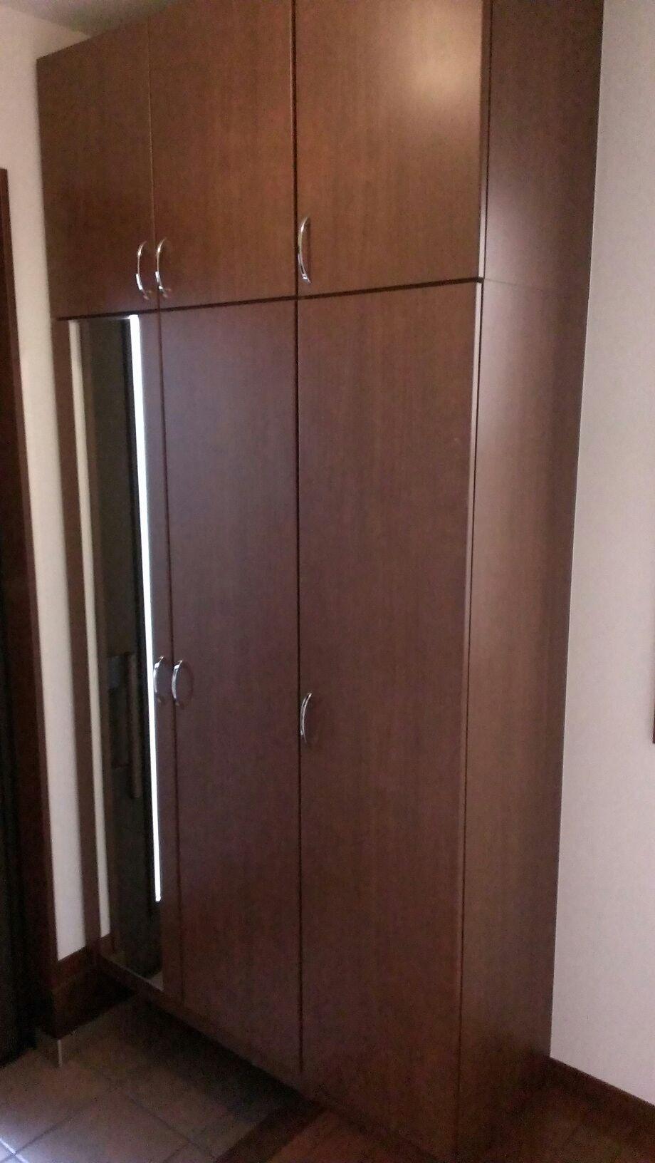 Entrance. I am happy with the front door storage. 