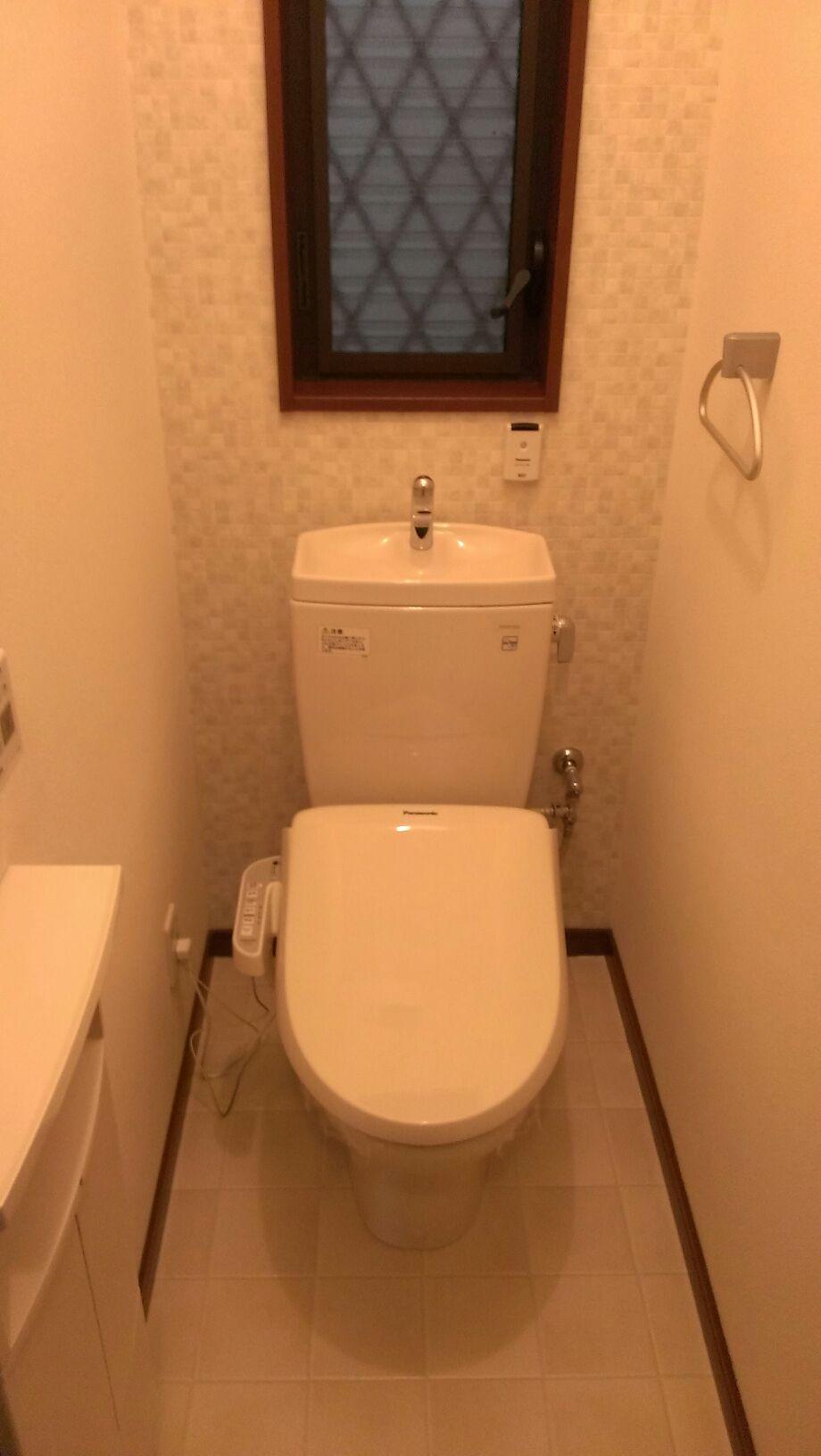 Toilet. It is a restroom with cleanliness. 