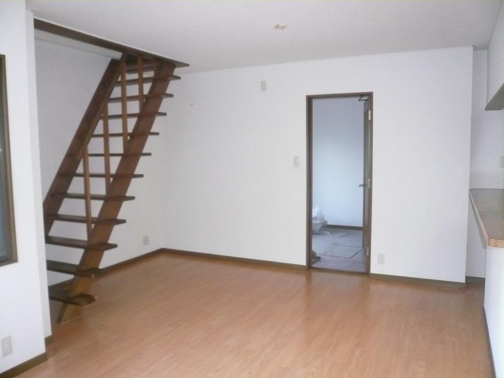 Living. In the living there is also a staircase to climb to the second floor