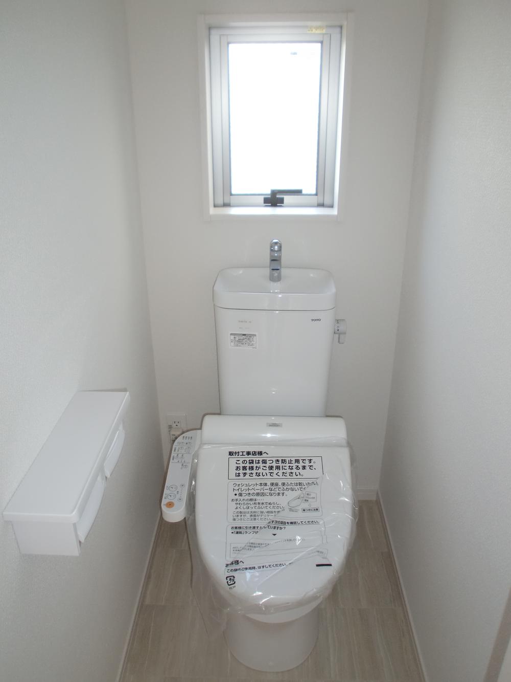 Toilet. Also offers toilet on the second floor