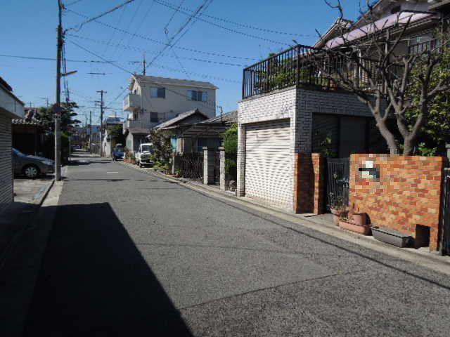 Local photos, including front road. Front road is spacious 5.4m