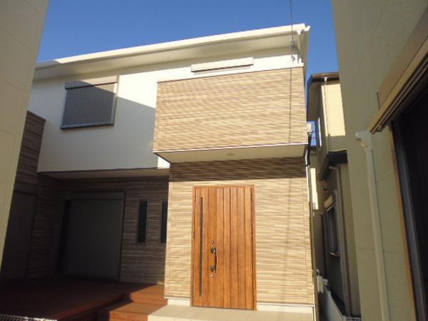 Local appearance photo. With wood deck! Stylish residence