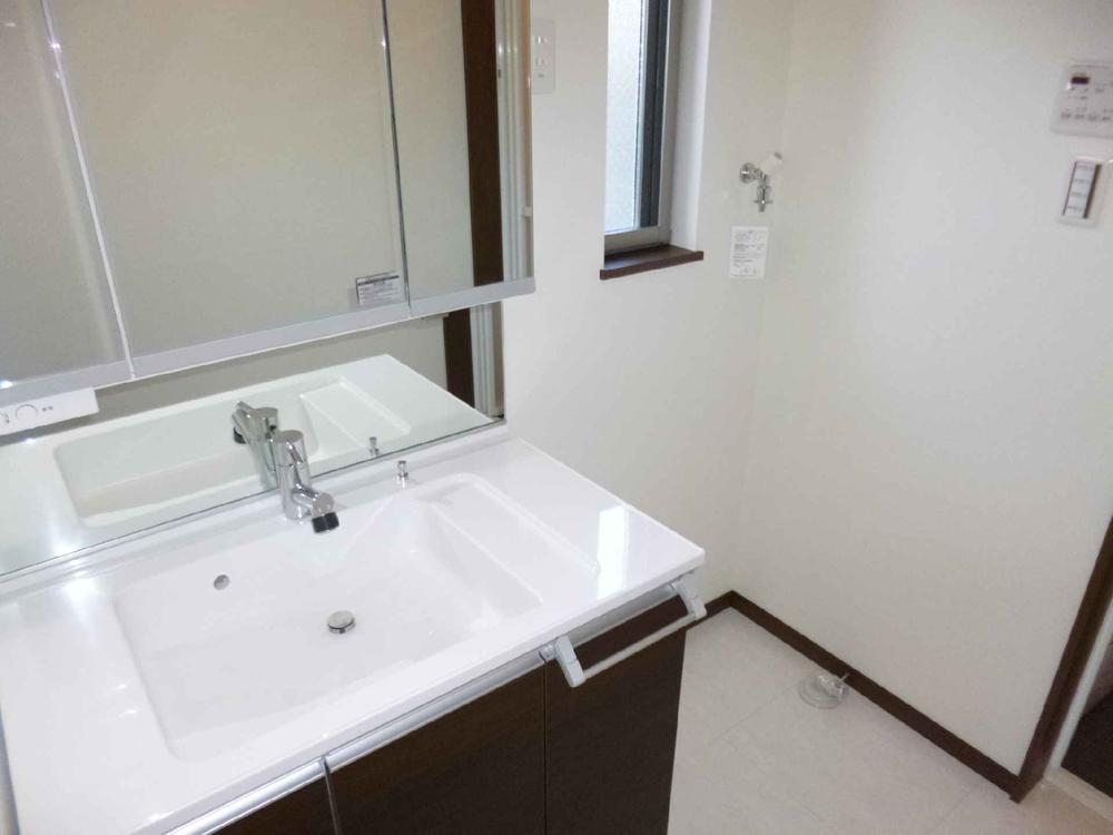 Wash basin, toilet. Water around, we have a standard specification Panasonic