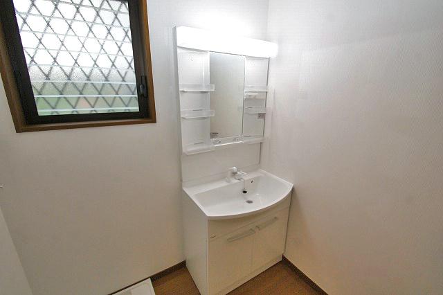 Wash basin, toilet. Vanity had made