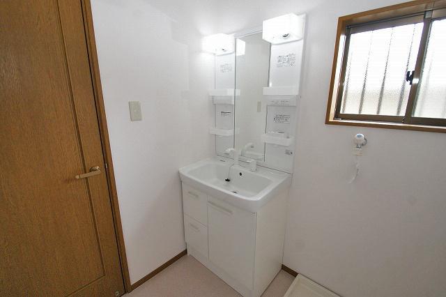 Wash basin, toilet. Vanity had made