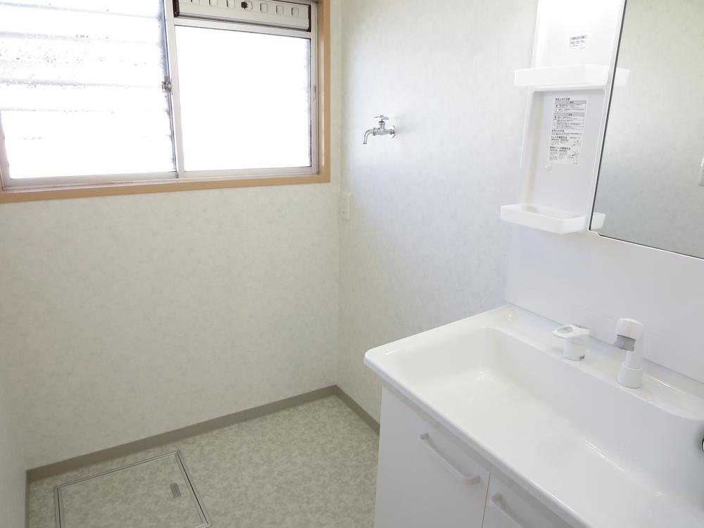 Wash basin, toilet. Vanity were also new