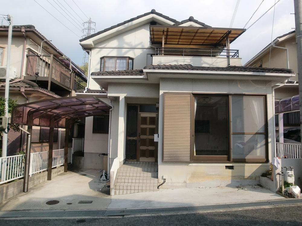 Local appearance photo. There is parking with car port