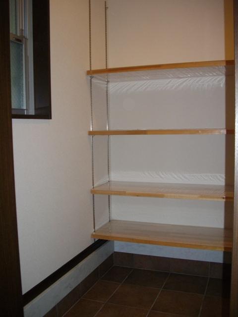 Other. Entrance next to shoes cloak