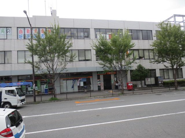 post office. 590m to Suita post office