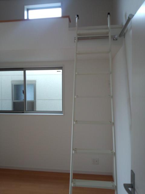 Non-living room. Ladder to the loft