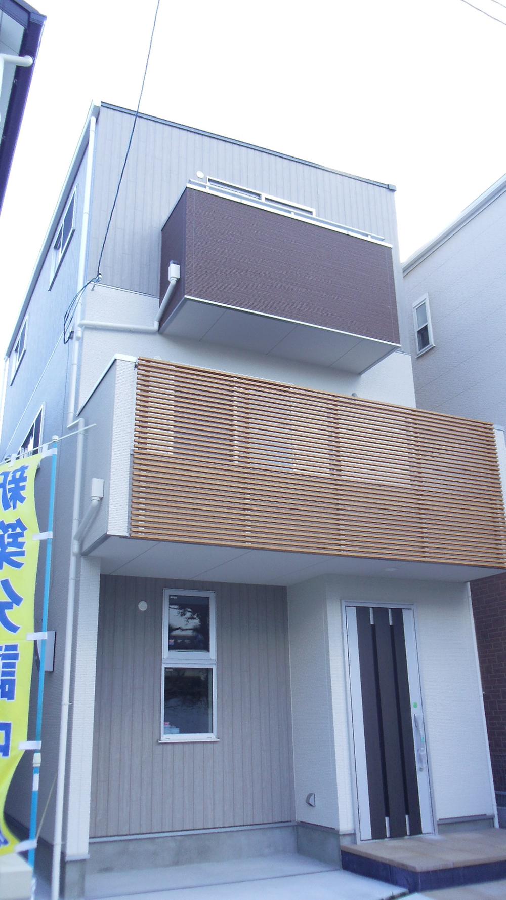 Local appearance photo. Balcony is Wood with warmth