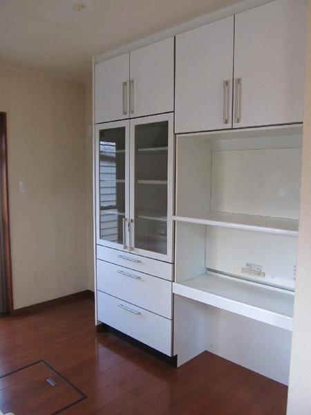 Kitchen. The kitchen there is a cupboard.