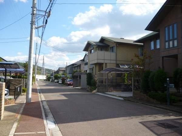 Local photos, including front road. Front road spacious 7.7m