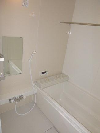Bathroom. Convenient for a rainy day with a bathroom dryer! You Jose also laundry