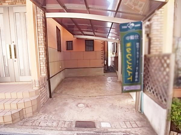 Parking lot. With car port of peace of mind even on rainy days