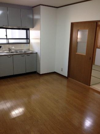 Living. Kitchen next to the balcony! It is comfortable with a view of the outside