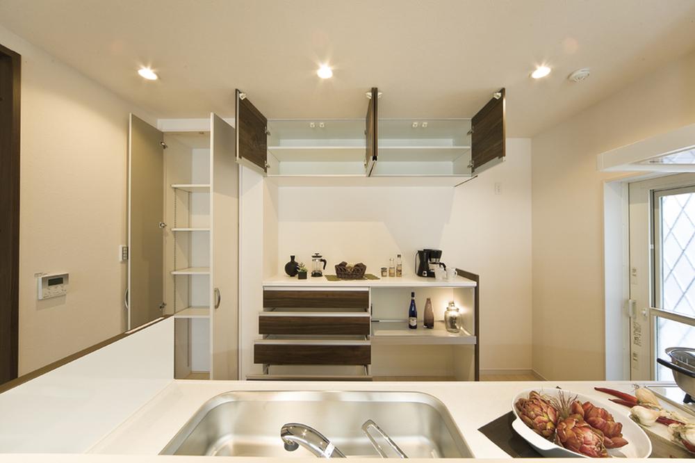 Kitchen. Plenty of storage in the kitchen. Happy one item in the pantry is mom dated with!