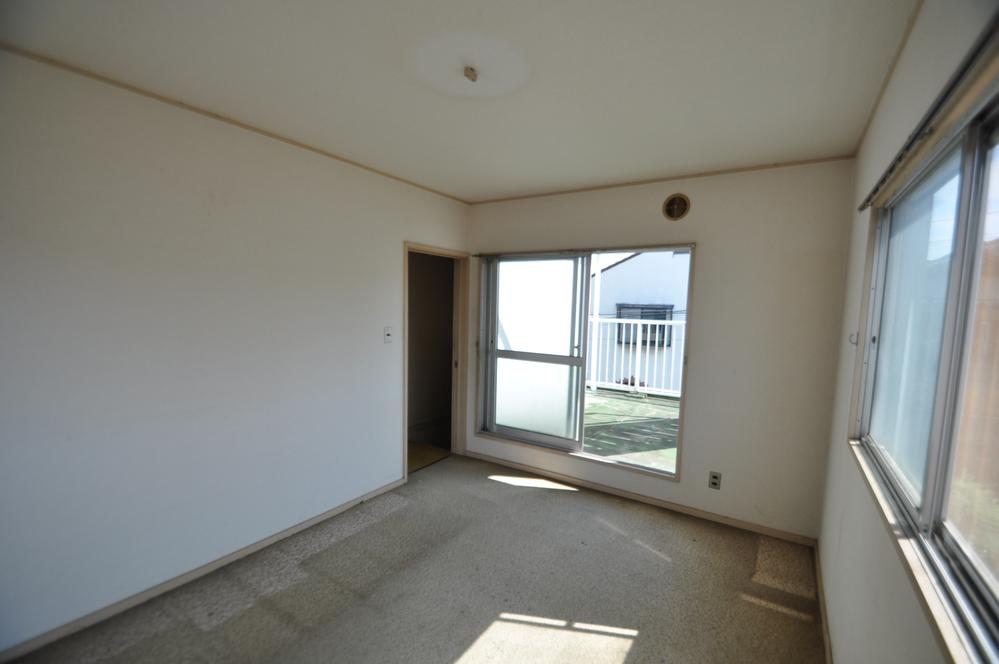 Non-living room. Stairs up and is left hand west of Western-style!