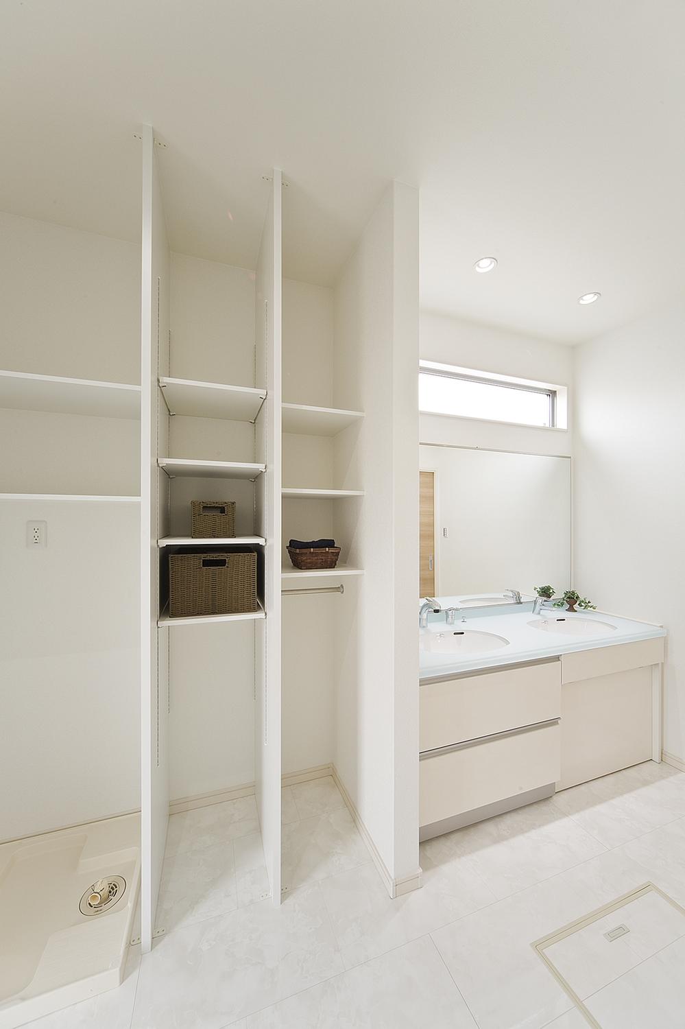 Wash basin, toilet. Wide type of vanity and functional lavatory was trouble the storage rack.