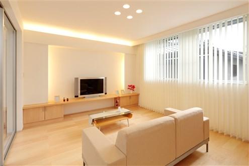 Building plan example (introspection photo).  [Our construction cases] Separate living space and or a movie, It has become a comfortable and welcoming space. Also down light is installed in the built-in of the TV board, Soft light will heal tired.