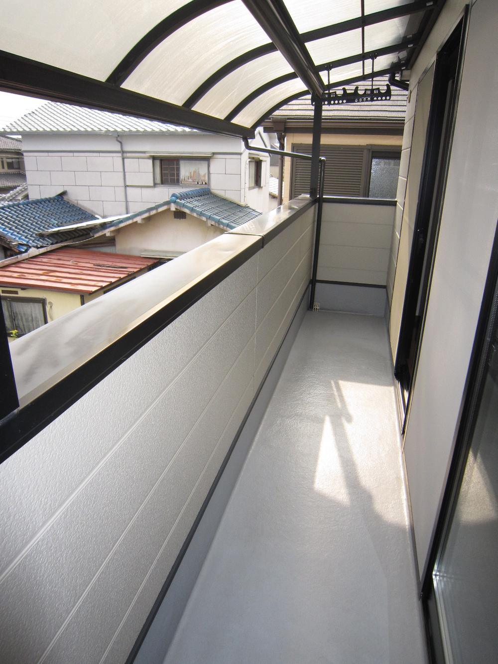 Balcony. It is with a roof. 