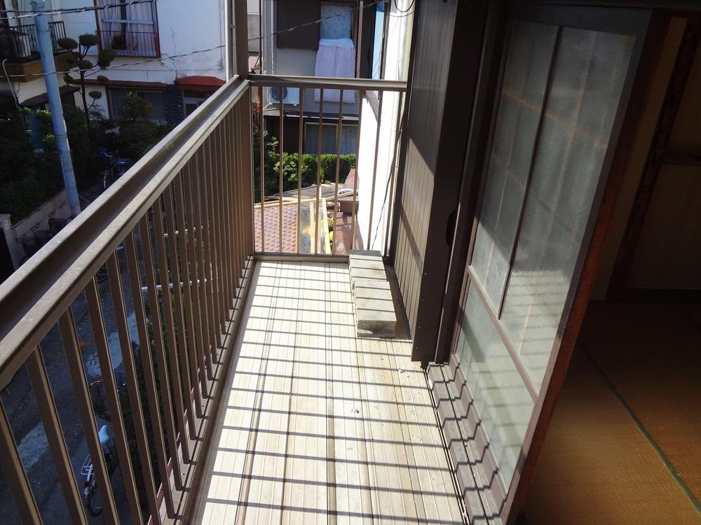 Balcony. The building has become outdated. 