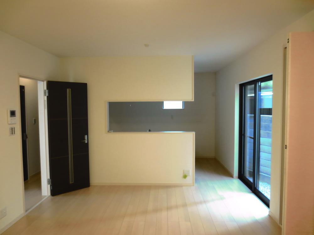 Living. Back is counter kitchen. Sunny