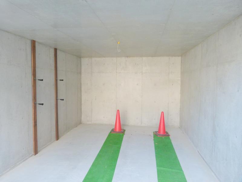 Parking lot. Enter shot in one box car because it is a large car park.