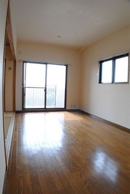 Living and room. Bright room has a window to the side