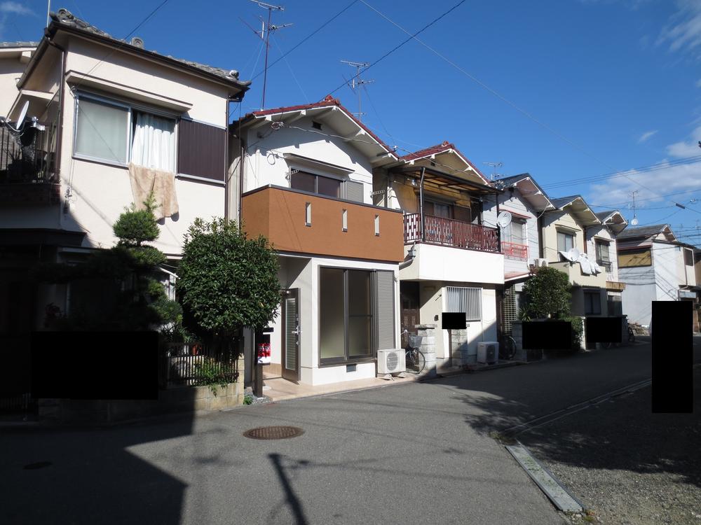 Local appearance photo. It is a photograph of the property, including the front road. Full renovated!