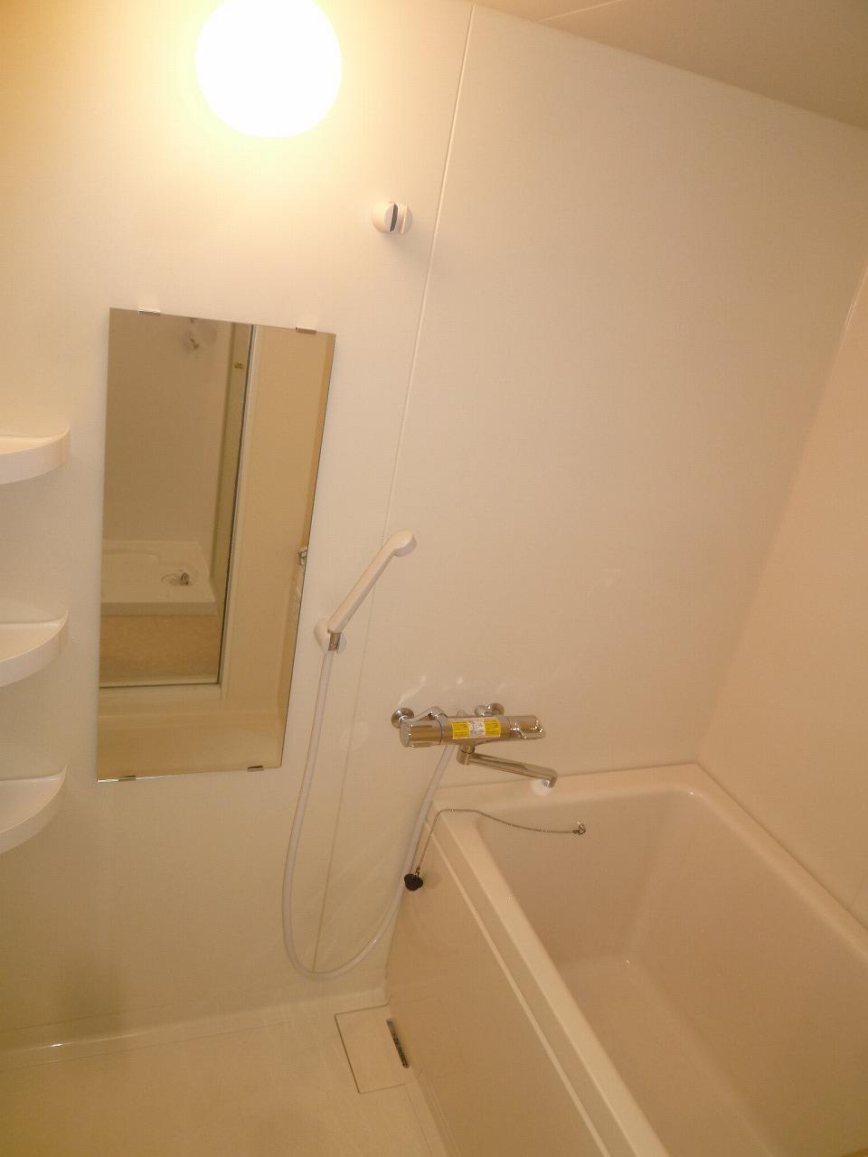 Bathroom. ・ We bathtub had made ・ It had made thermo shower faucet ・ We had made corner shelf