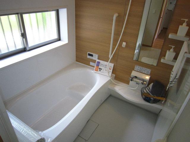 Bathroom. Bright bathroom which adopted the bright panel with light brown