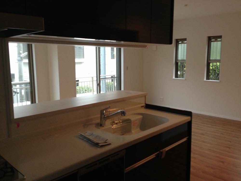 It is always bright in the room because the sun shines bright and the living kitchen