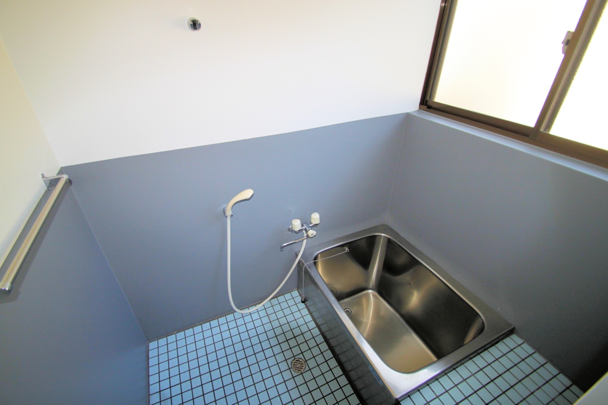 Bath. There is a window ventilation is easy bathroom