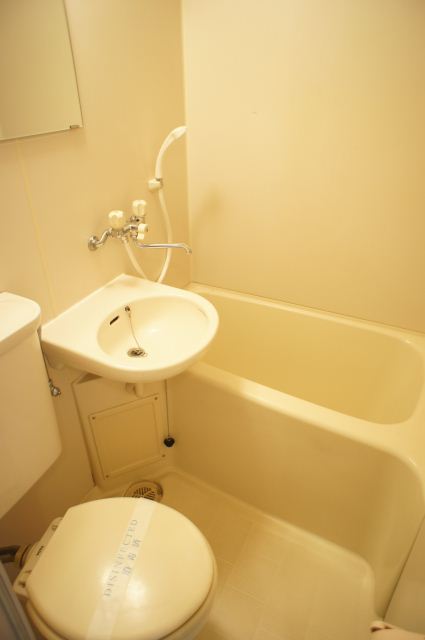 Bath. Unit is a bus with cleanliness