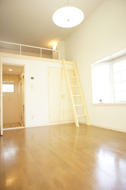 Living and room. There is a feeling of opening higher ceiling. With loft