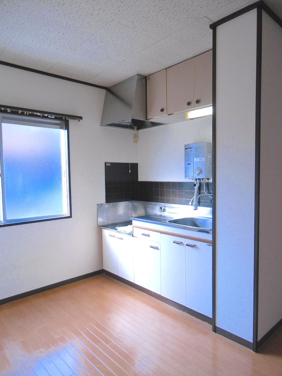 Kitchen. It is a kitchen with a small window